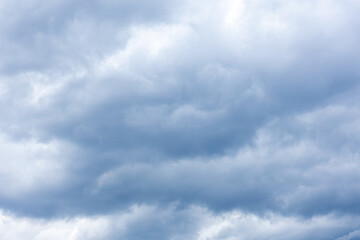 Fototapeta premium Dramatic blue storm clouds in overcast sky background