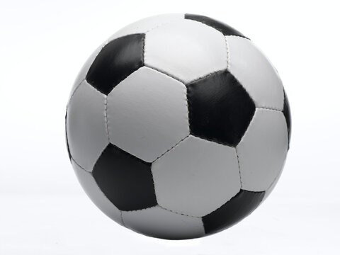 Football against white background, close-up