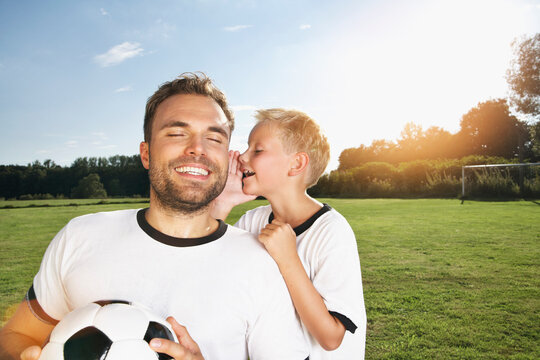 Germnay, Cologne, son whispering in father's ear