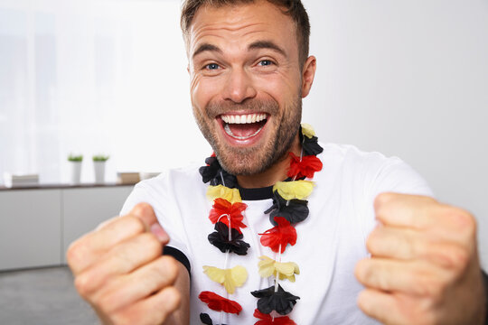 Excited soccer fan cheering