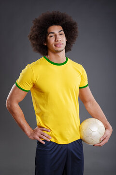 Portrait of Brazilian soccer player, studio shot