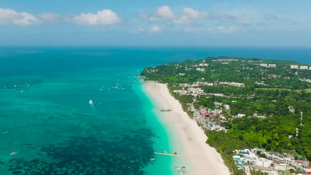 Tropical landscape of long stretch of powdery white sand and crystal clear water. Boracay, Philippines.