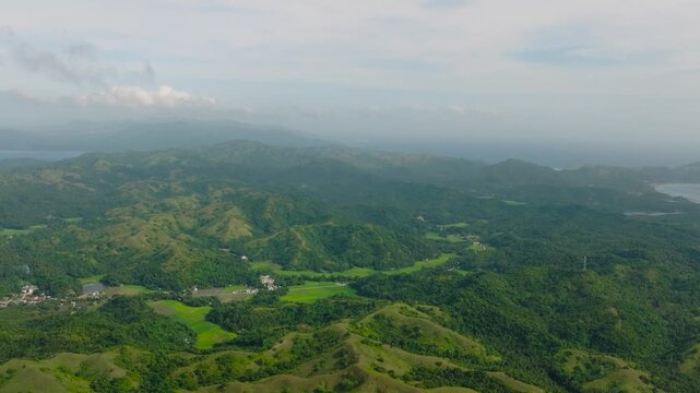 Aerial view of mountain valleys and green forest. Santa Fe, Tablas, Romblon. Philippines.