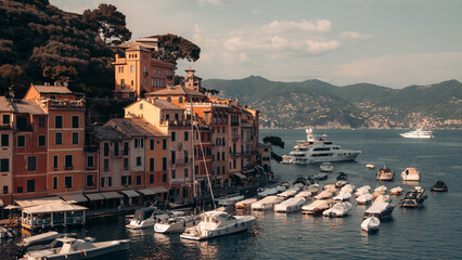 Portofino seaside town with fisherman boats at sunset, Italian Riviera, Liguria, Italy, Europe