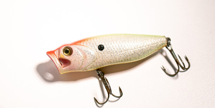 Fishing accessories bobbers, hooks, tackles, baits isolated on white background. Image for shop for fisherman. Close up