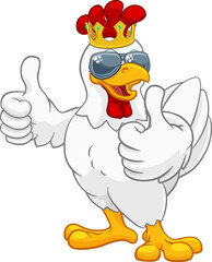 A chicken rooster cockerel bird cartoon character in a kings gold crown and cool shades or sunglasses giving a double thumbs up © Christos Georghiou