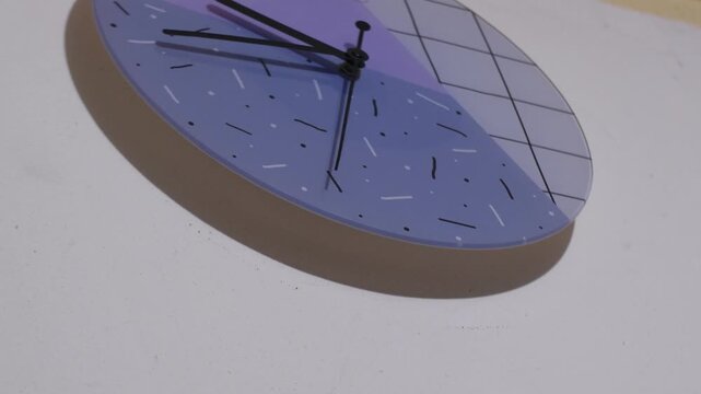 close up of the broken second hand of a clock