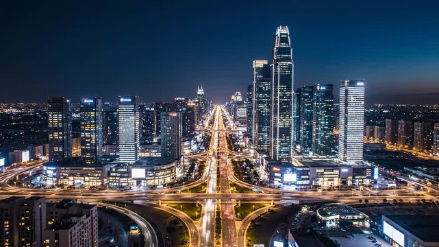 Expansive metropolis skyline at night, illuminated by a vast network of glowing roads and towering architectural marvels, showcasing urban development and vibrant city life progressing