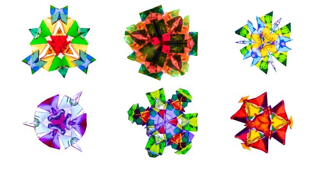 Set of isolated elements of a real kaleidoscope shot on camera. Natural colorful ornaments on white background for patterns, sticker design, web graphics, presentations, crafts. (187 characters)