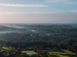 Fototapeta premium Aerial scenic view of foggy morning.