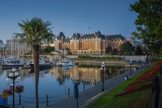 Victoria Inner Harbour view with The Empress Hotel at sunset - Victoria, British Columbia, Canada
