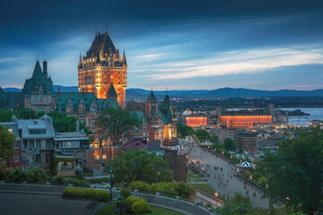 Fototapeta premium Quebec City high angle view with Chateau Frontenac and Terrasse Dufferin at night - Quebec City, Quebec, Canada