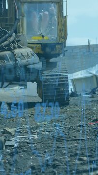 Vertical video: Operator nudging lever excavator inching bucket twitching blue overlay showing data