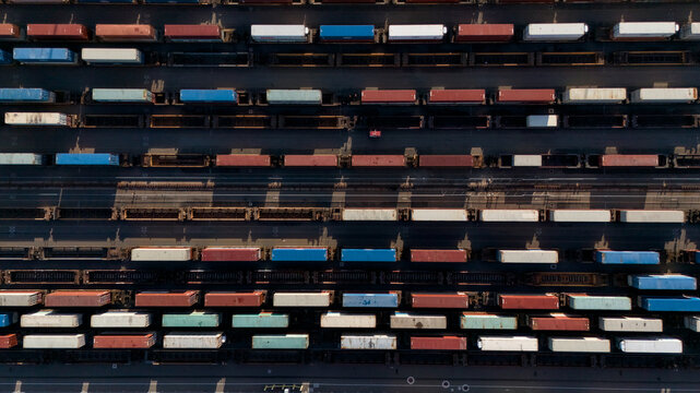 Top down aerial view of freight trains in railway yard