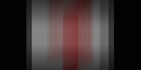 Abstract red stripe against a dark background with a grainy texture, creating a minimalist and striking visual effect. © mia