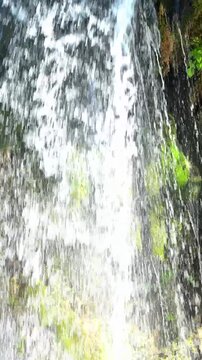 waterfall in the forest close up slow motion clean water 
