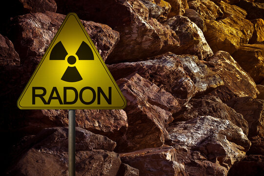 DANGEROUS NATURAL RADON GAS EMERGING FROM A ROCK CRACK - RADIOACTIVE WARNING SYMBOL HIGHLIGHTS GEOLOGY, RADIATION, CONTAMINATION AND ENVIRONMENTAL HAZARD RISKS