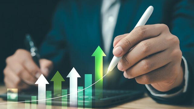 Professional businessperson analyzing financial growth charts on a digital tablet with a stylus, symbolizing success and progress
