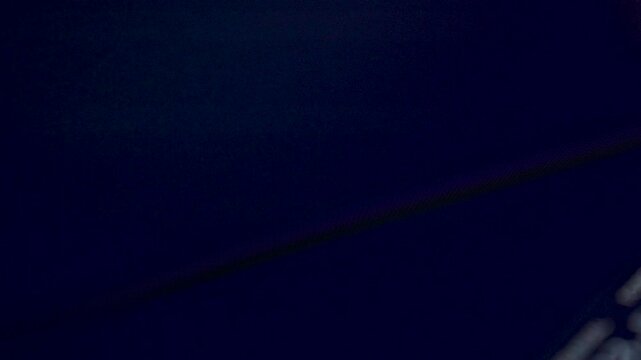 Coding programs on black screen background.