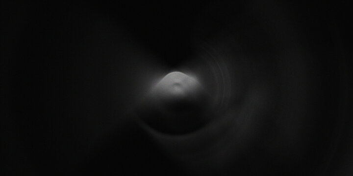Dark monochromatic abstract composition with soft central glowing light creating mysterious misty orb effect in subtle shadow.