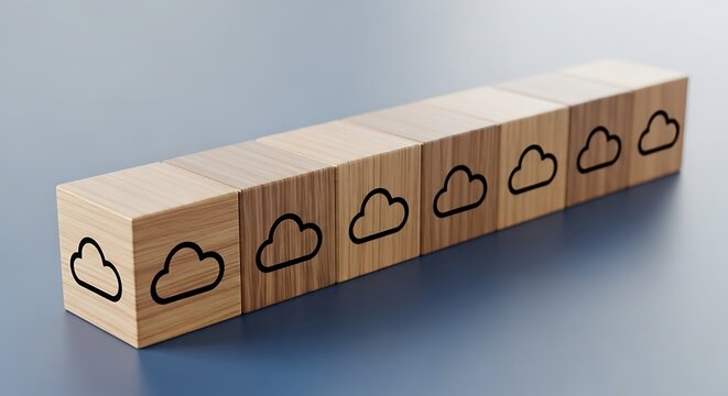 Wooden blocks with cloud symbols on a blue surface