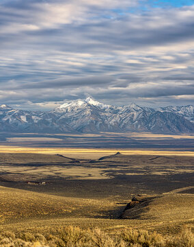 Snowcapped mountains with a dramatic sky in the arid Northern Nevada desert