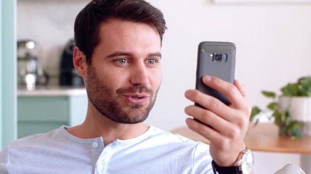 Influencer, man and live streaming in home with phone, hair care and grooming tips for social media. Happy, person and record video in house with discussion, tech and content creation for hairstyle.