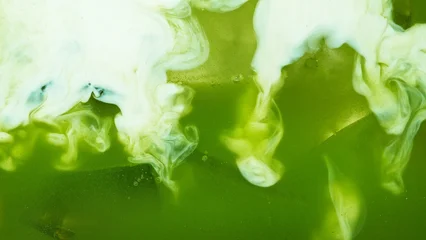 Pour of Milk Into Iced Matcha Latte © Lukas Gojda