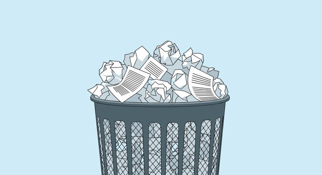 Overfilled gray office wastebasket piled high with crumpled white papers and discarded documents against a plain blue background.