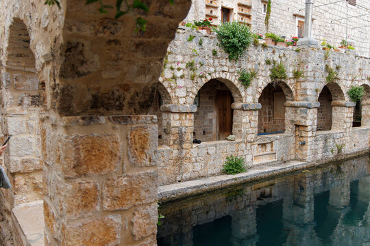 Historic Tvrdalj Castle Courtyard and Reflecting Pool in Stari Grad, Hvar Island, Croatia