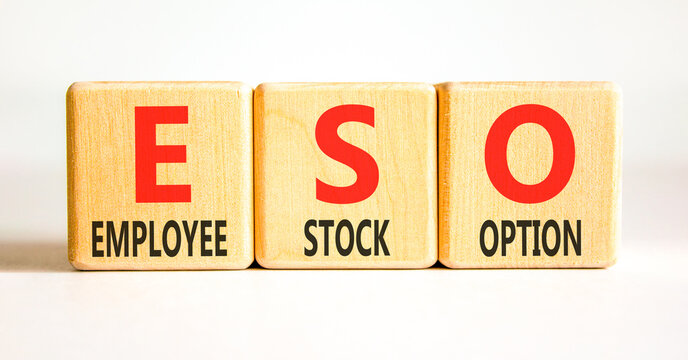 ESO employee stock option symbol. Concept words ESO employee stock option on beautiful wooden blocks. Beautiful white background. Business ESO employee stock option concept. Copy space.