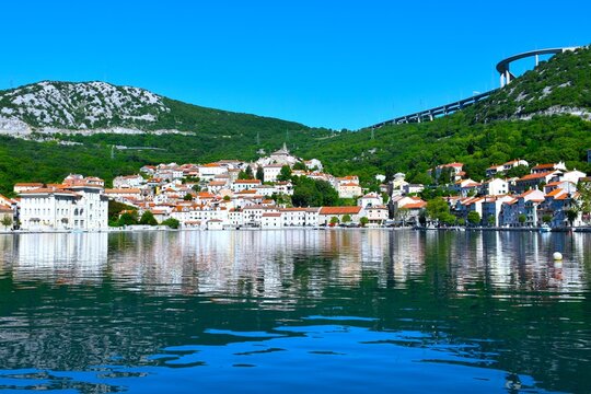 Bakar coastal town bellow forest covered hills at the Adriatic sea coast in Kvarner, Primorje, Croatia