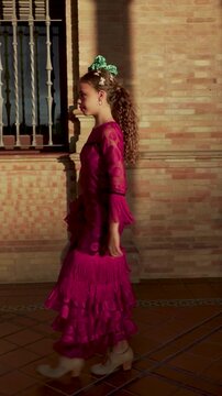 Traditional Spanish girl dancing flamenco in Seville, Spain