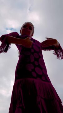 Traditional Spanish girl dancing flamenco in Seville, Spain
