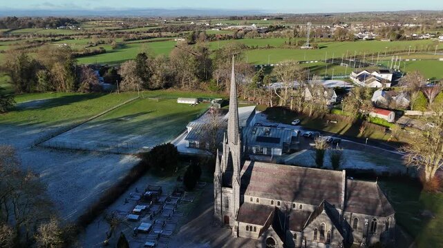 Aerial View of Church of St. Michael and All Angels in Irish Town, 4K Drone Footage	
