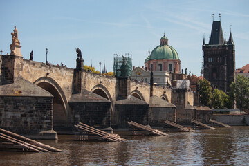Obraz premium Scenic view of historic Charles Bridge and Old Town Bridge Tower in Prague Czech Republic