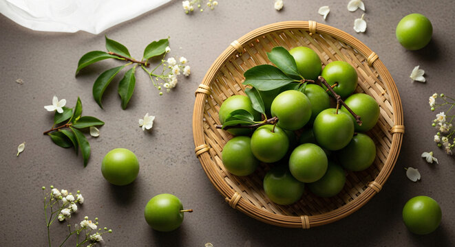 Ume Plums, Fresh Plums, fresh green ume plums in bamboo basket harvest, light fresh floral, Wabi-sabi, Flatlay view