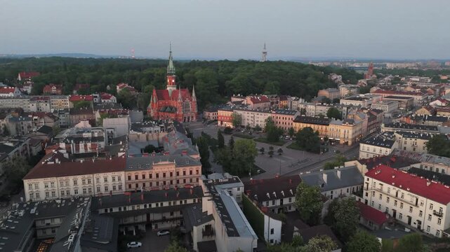 Aerial flyover of Krakow's Old Town at dawn in spring