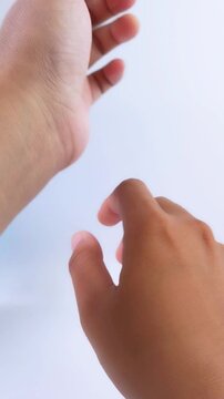 Closeup of hand skin tone comparison showing UV damage protection. Vertical footage for beauty whitening treatment content.