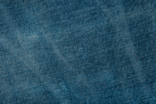 Blue denim fabric texture close up surface