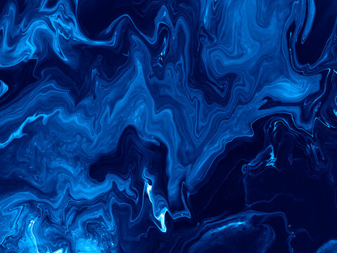 Neon blue abstract fantastic creative hand painted dark background, marble and brush texture, abstract ocean, acrylic