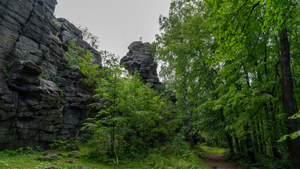 Fototapeta premium Seven Brothers and One Sister, remnants of rock at top of Semibratskaya Mountain in Middle Urals, Nevyansky district, Sverdlovsk region, Russia, near village Verkhneuvinsky