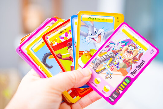 Looney Tunes Sportarena trading cards featuring Bugs Bunny and Daffy Duck, collectible gaming cards on table, variety character cards with sports theme, hobby and fun, playful pop culture collectibles