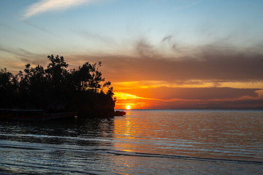 Sunset on Lia beach, Waleakodi Island, Togian archipelago, Sulawesi, Indonesia