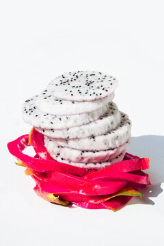 Fresh Dragon Fruit Slices Isolated on White Background