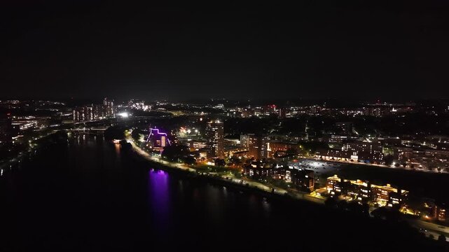 Boston Skyline at Night, Aerial Drone View of Illuminated City Skyscrapers and Downtown Buildings, Financial District Waterfront Harbor Cityscape Evening Lights in Massachusetts, USA
