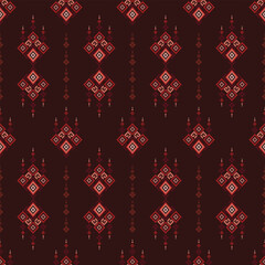 Naklejka premium Elegant burgundy geometric ethnic seamless pattern with diamond ornaments inspired by traditional woven fabrics.