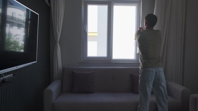Opening apartment window with unexpected wall view, rental housing reality and urban isolation concept in small hotel room or temporary living space