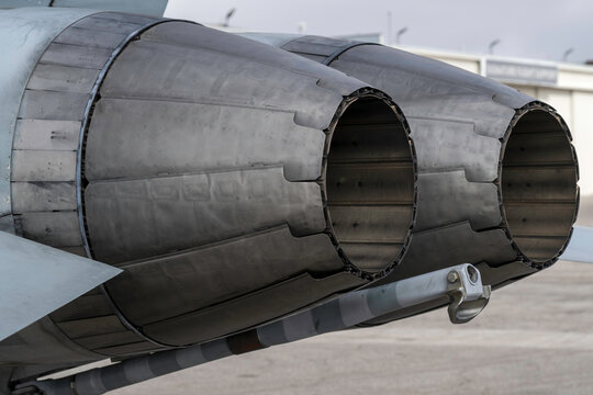 MISSISSAUGA, ON, CANADA &ndash; FEB 4, 2024: Close-up detail of the twin General Electric F404 afterburner engine exhaust nozzles on a Royal Canadian Air Force CF-188 Hornet fighter jet parked on the tarma