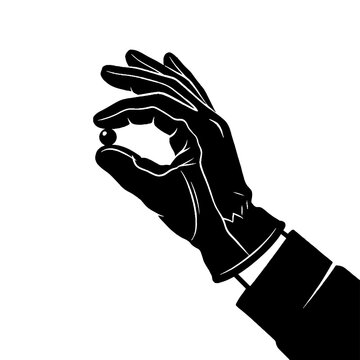 Gloved hand holding a small dark sphere in a precise grip.
